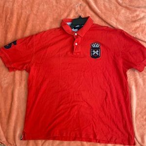 Vintage XXL Red knit Tommy Hilfiger polo shirt. Crest on chest & 85 on sleeve